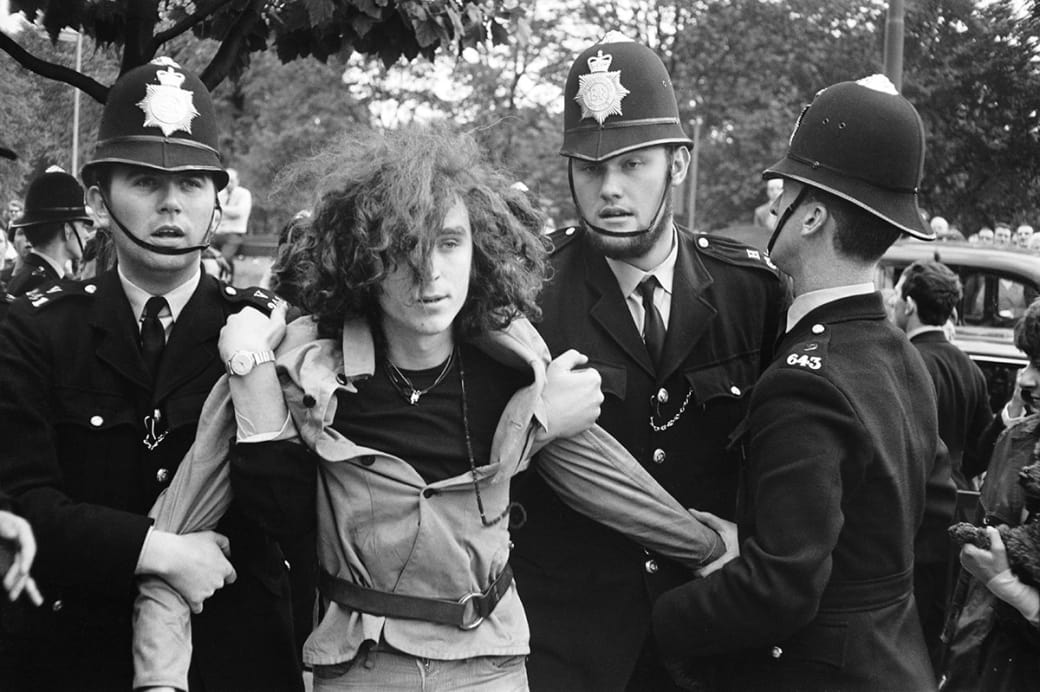 A young Piccadilly squatter is evicted by London police in1969.