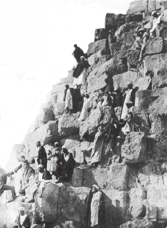 1880s a group of people seen descending the pyramid