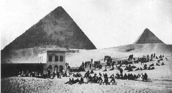 Troops seen in front of the pyramids around 1880